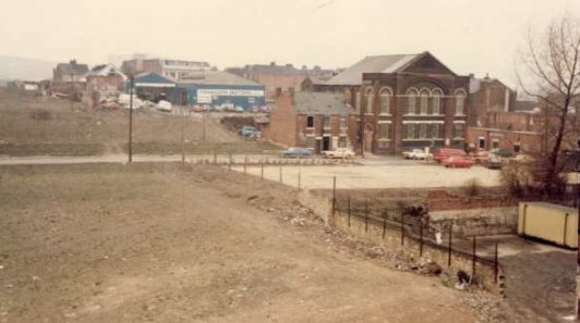 Wider view of the masjid in 1984 surrounded by cleared land