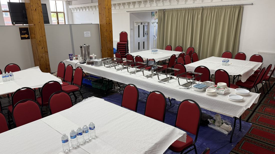 Venue set up with a buffet for a hosted event